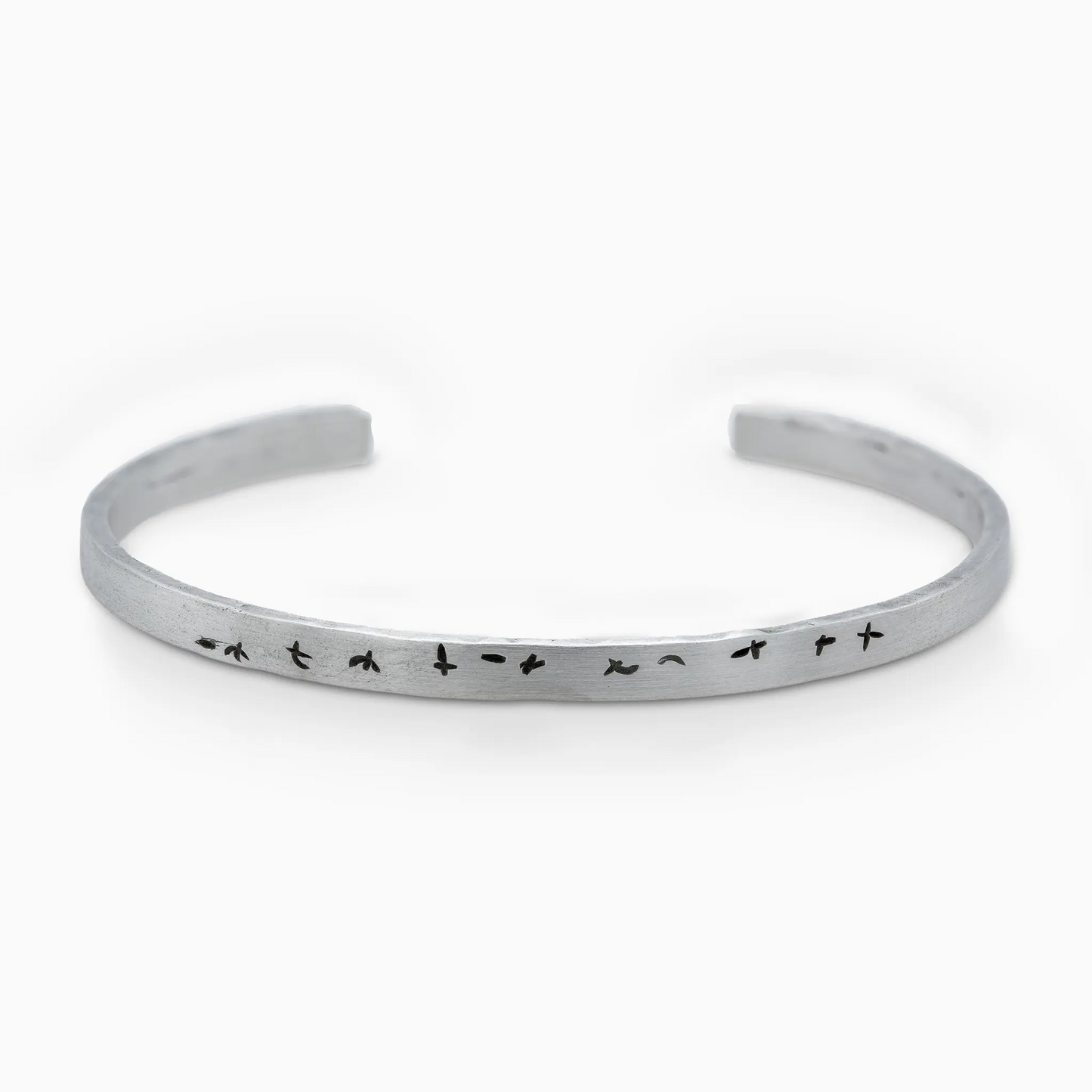 Sterling Silver handcrafted silver Birds Echelon bracelet with bird patterns, 4.5mm width, lightweight open cuff design.
