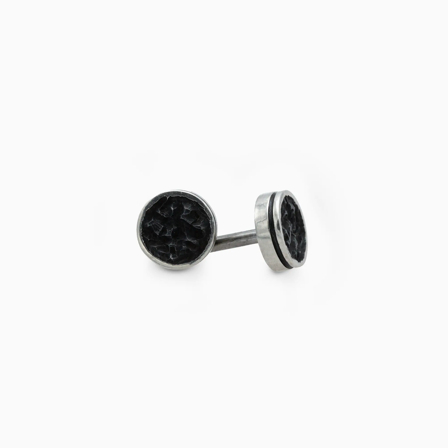 Handcrafted silver Eclipse Earrings with oxidized centers and sleek round frame.