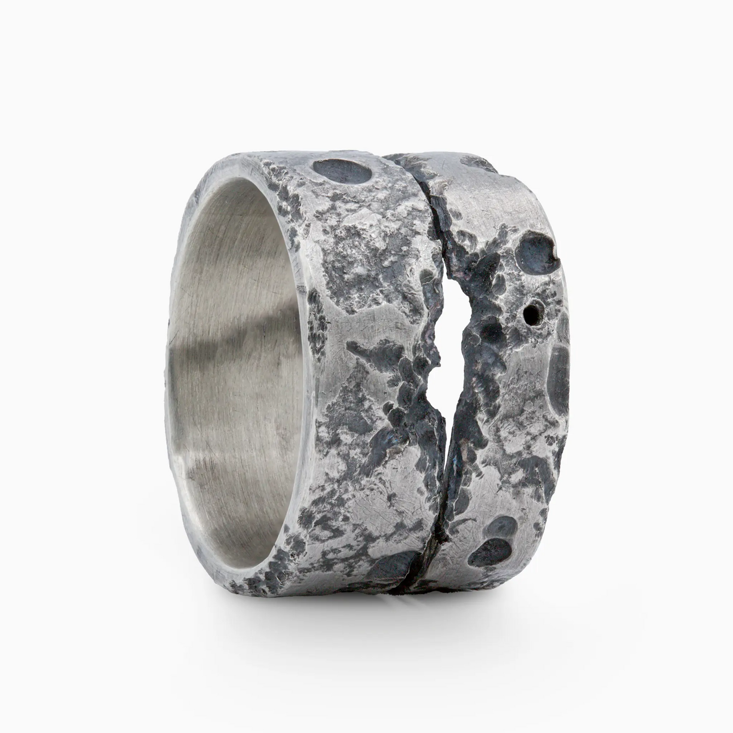 Sterling Silver silver ring with rugged texture and bold central crack.