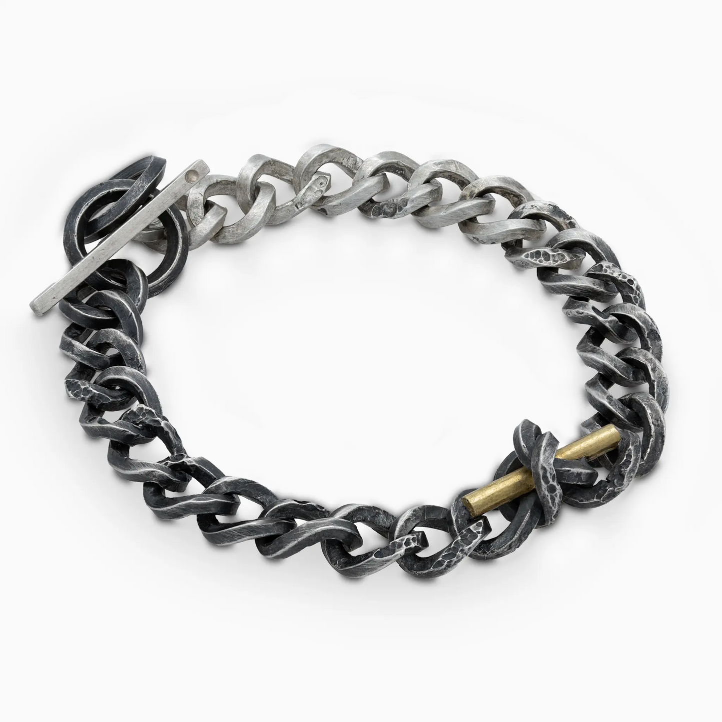 Sterling Silver staff and Chain bracelet displayed flat, featuring a blend of silver and gold elements, symbolizing resilien…