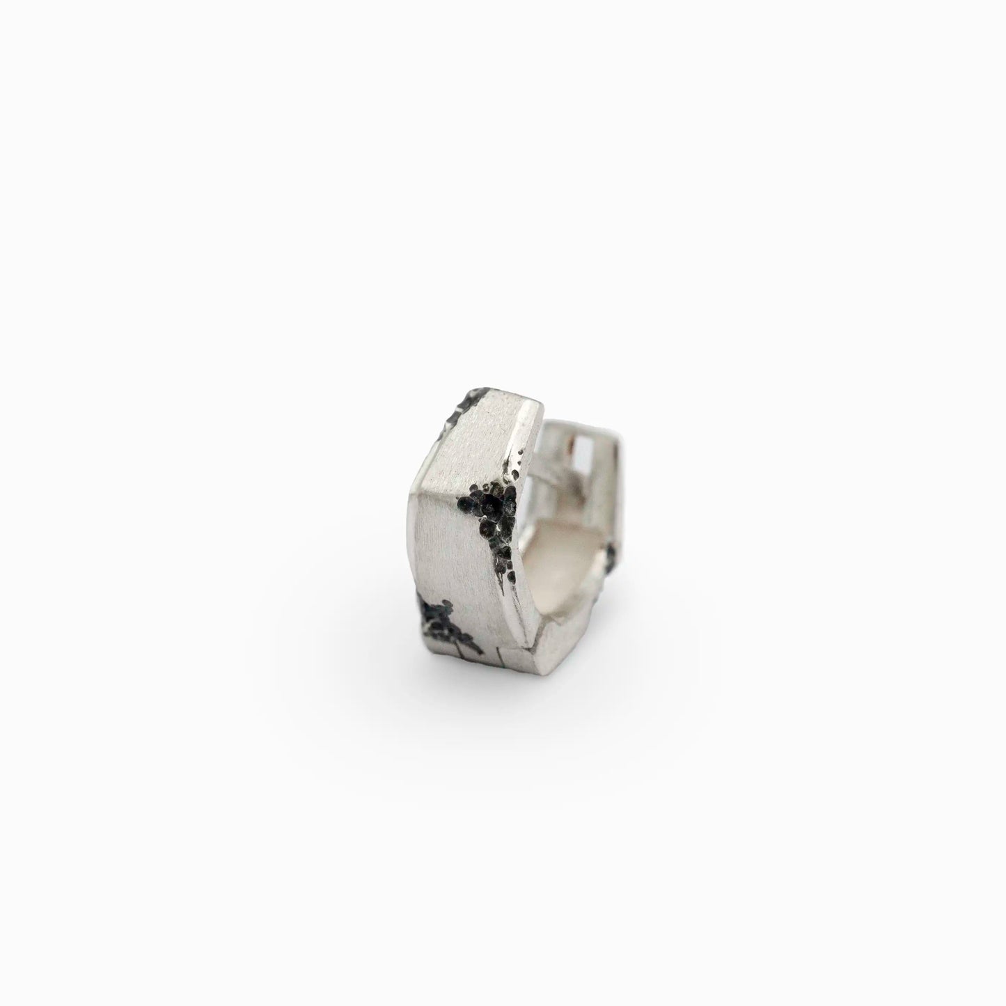 Sterling silver Ekko Earring with corrosion finish, handcrafted with oxidized details and textured surface.