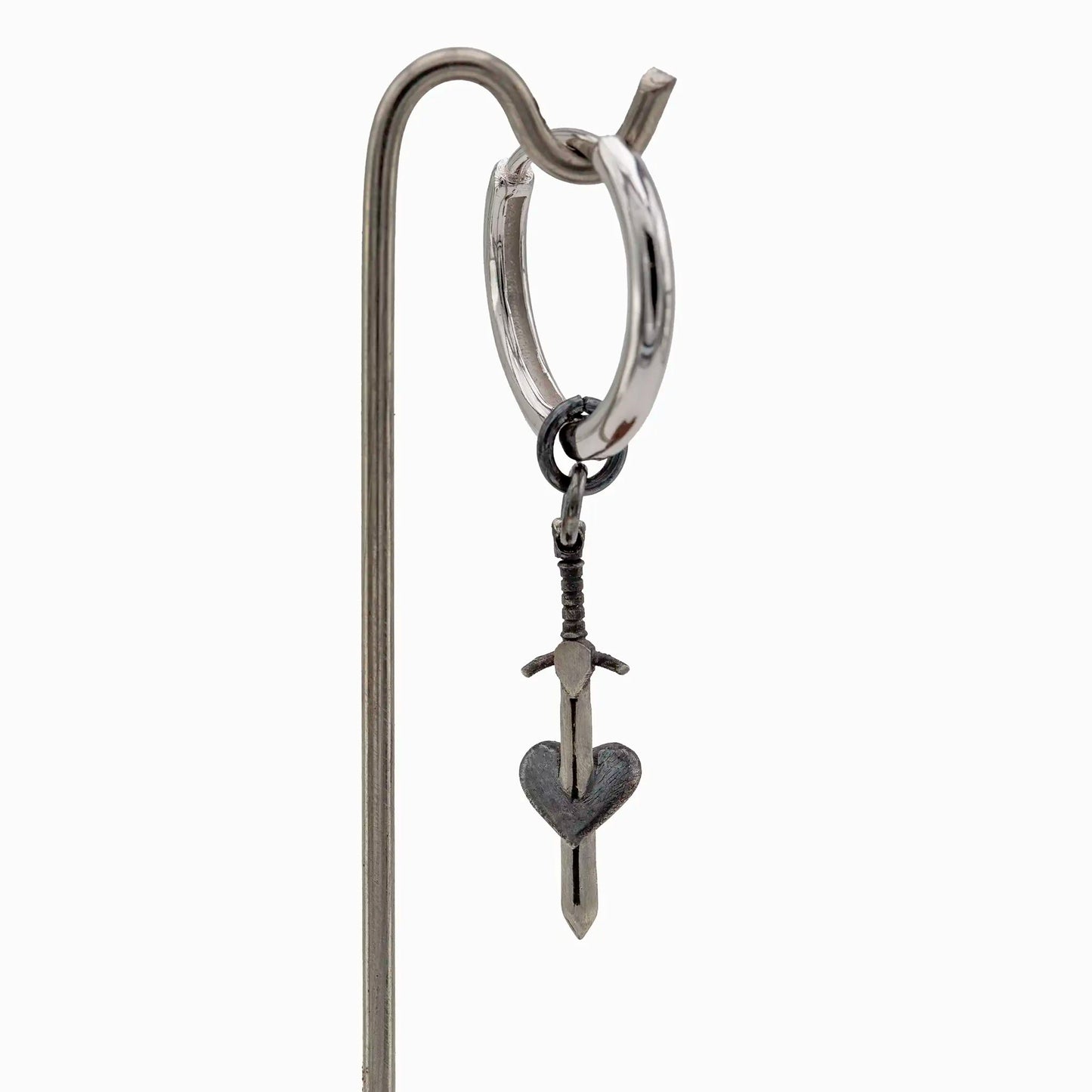 Sterling silver hoop earring with sword and black heart pendant, oxidized finish