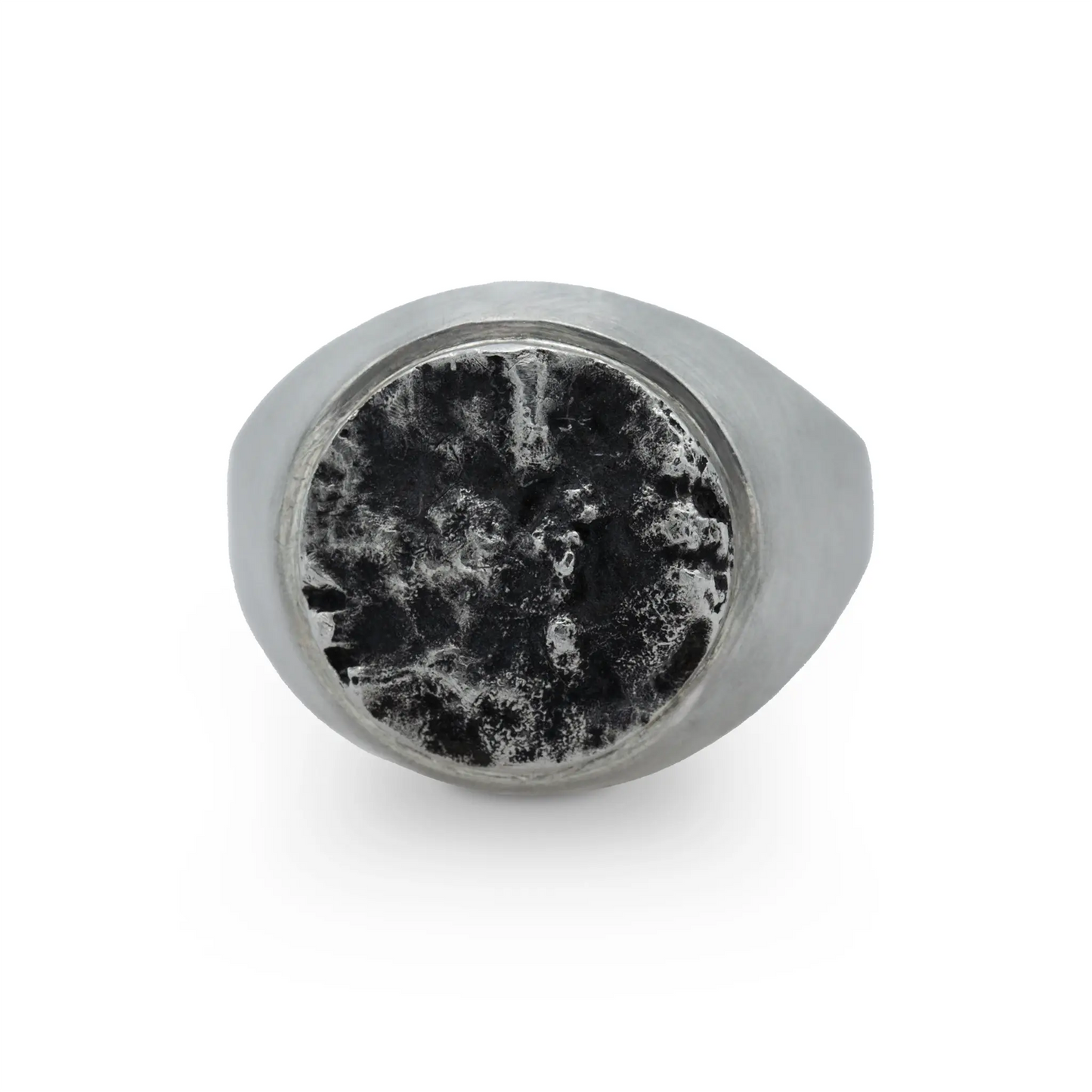 Textured silver ring with a moon surface-inspired design, front-facing view.