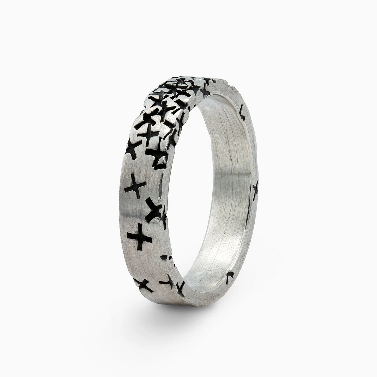 Sterling Silver silver ring with textured black crosses, highlighting bold and artistic design.