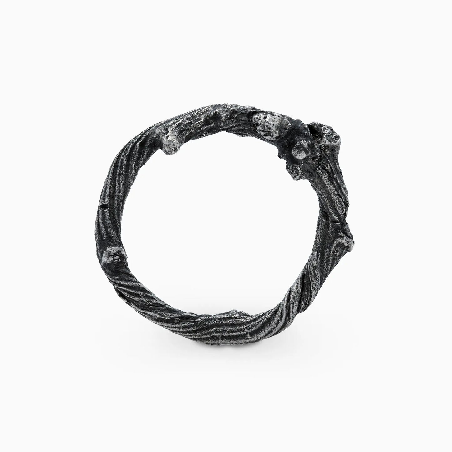 Sterling silver side profile of an organic-themed ring with intricate details and natural textures, inspired by wilderness.