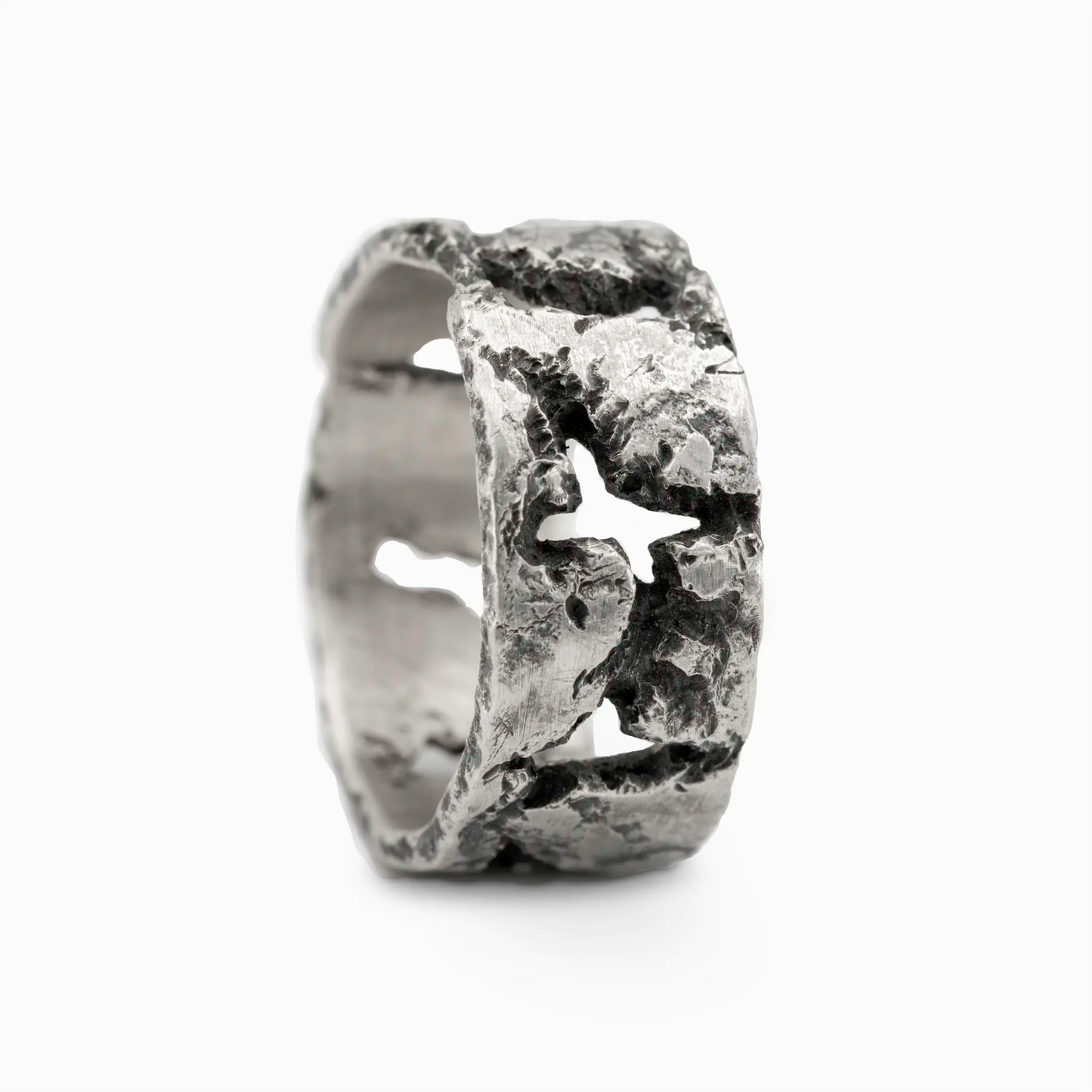 Sterling Silver rugged silver ring with an openwork design featuring rough, organic textures and irregular cutouts.