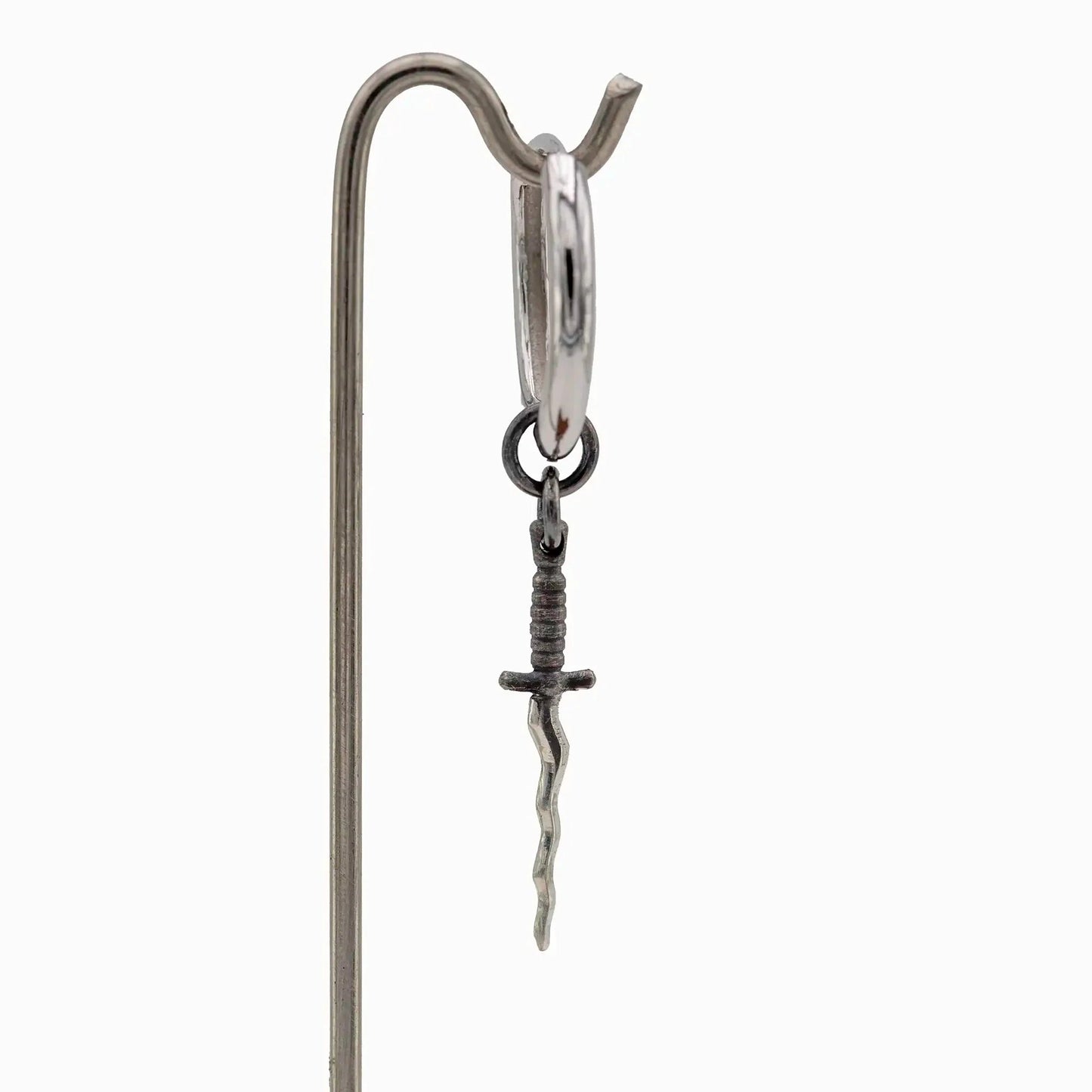 Sterling silver hoop earring with oxidized wavy sword pendant