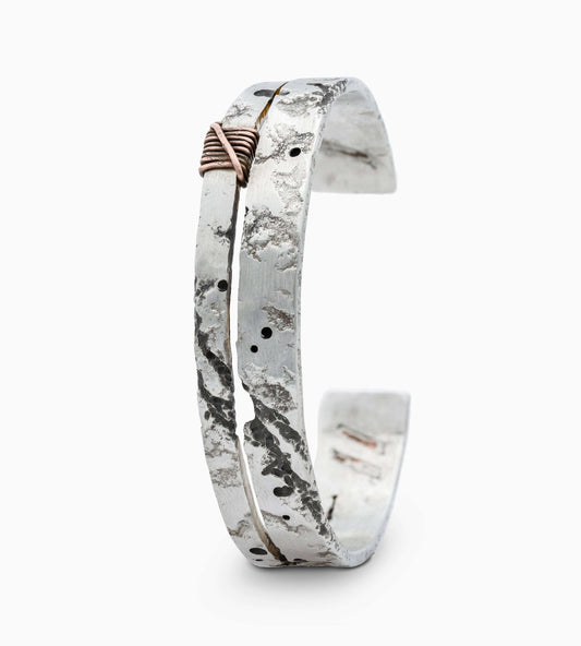 Handcrafted ISRT 925 silver bracelet featuring textured design and unique elements, with a width of 14 mm and thickness of 2.2 mm.