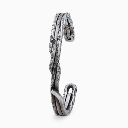 Handcrafted 925 silver Sativa bracelet with a textured, intertwined design, 6 mm wide and weighing 15 g. Unique one-of-a-kind piece.