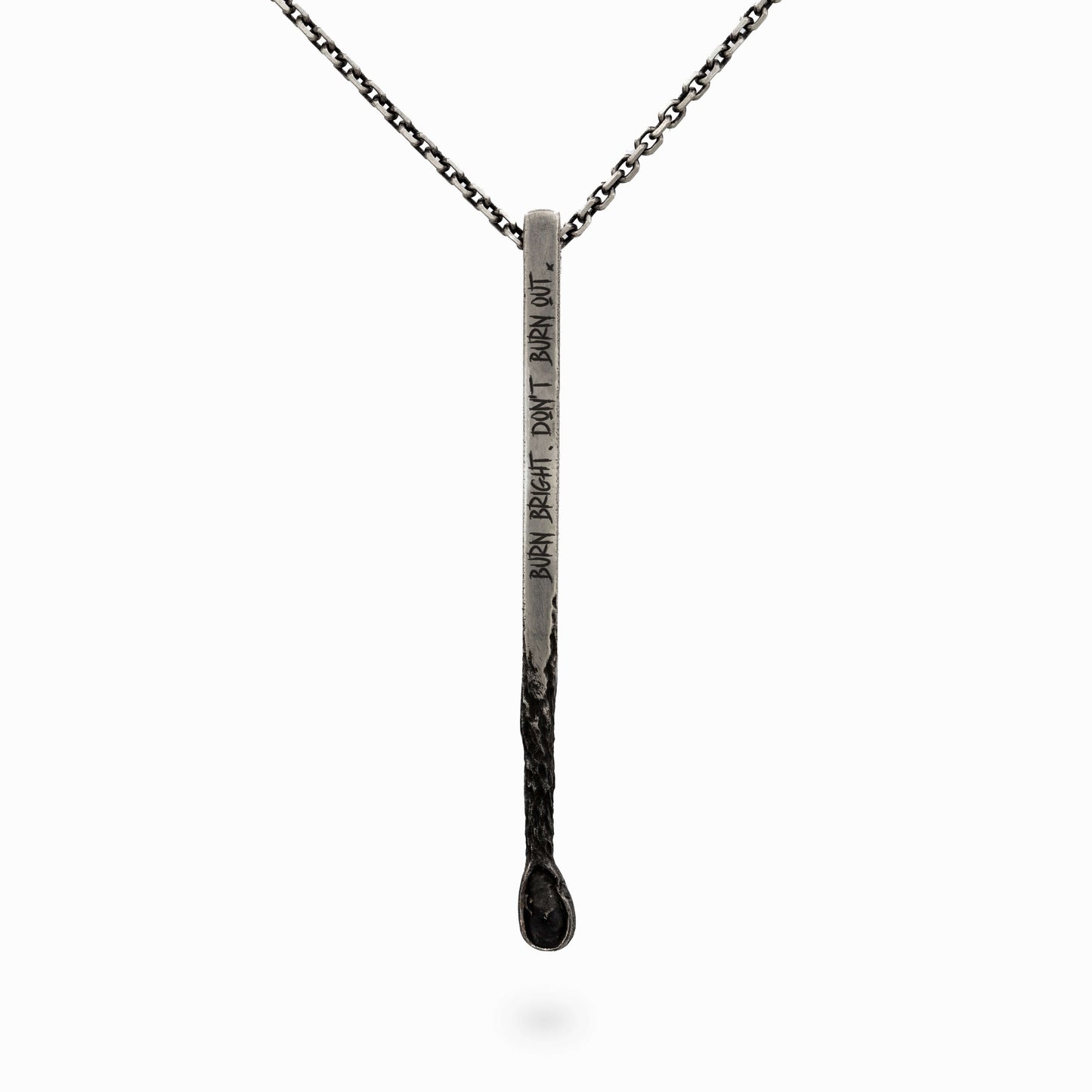 Silver matchstick pendant with 'Burn Bright, Don’t Burn Out' engraving. A powerful statement piece celebrating inner fire and resilience.