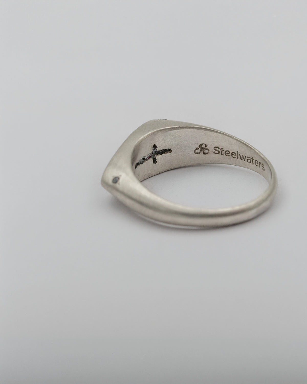 Void Ring White | Matte Sterling Silver Ring with Cross Opening, Natural Rubies and Black Diamonds
