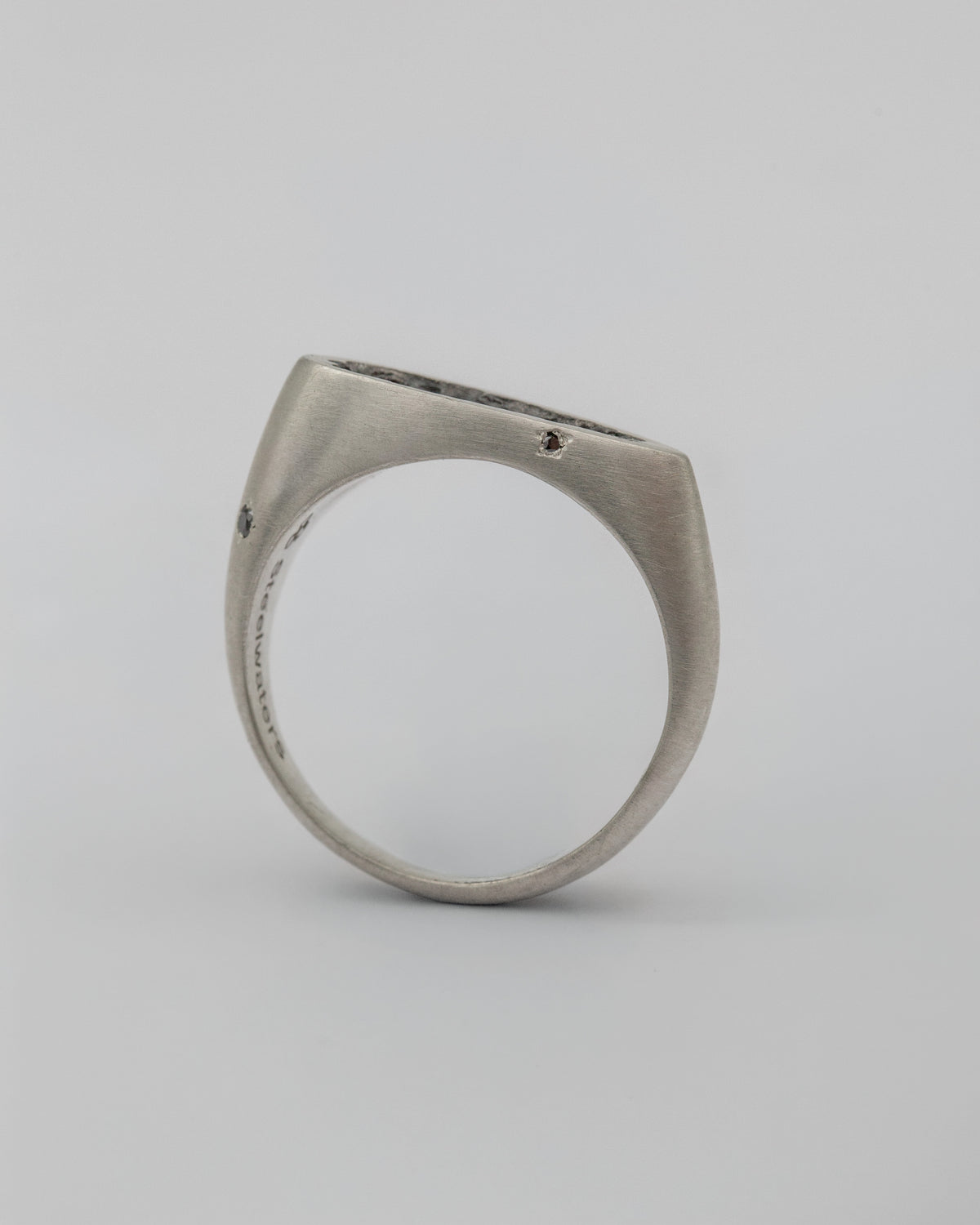 Void Ring White | Matte Sterling Silver Ring with Cross Opening, Natural Rubies and Black Diamonds